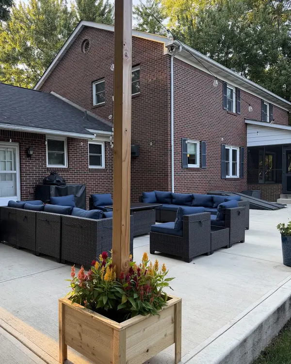 Handmade cedar planter box with an integrated patio light post